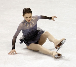 Sasha Cohen slips and falls while performing her free skate routine at the U.S. Figure Skating Championships in Spokane, Wash., Saturday, Jan. 23, 2010. (AP Photo/Rick Bowmer)