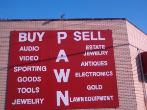 Pawn Shop Advertisement on side of building