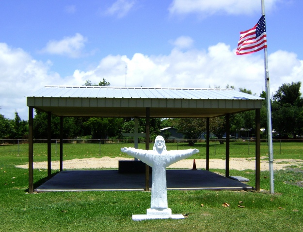 Jesus Statue & American Flag: Should Churches Plan Worship Services To Commemorate Civic Holidays?